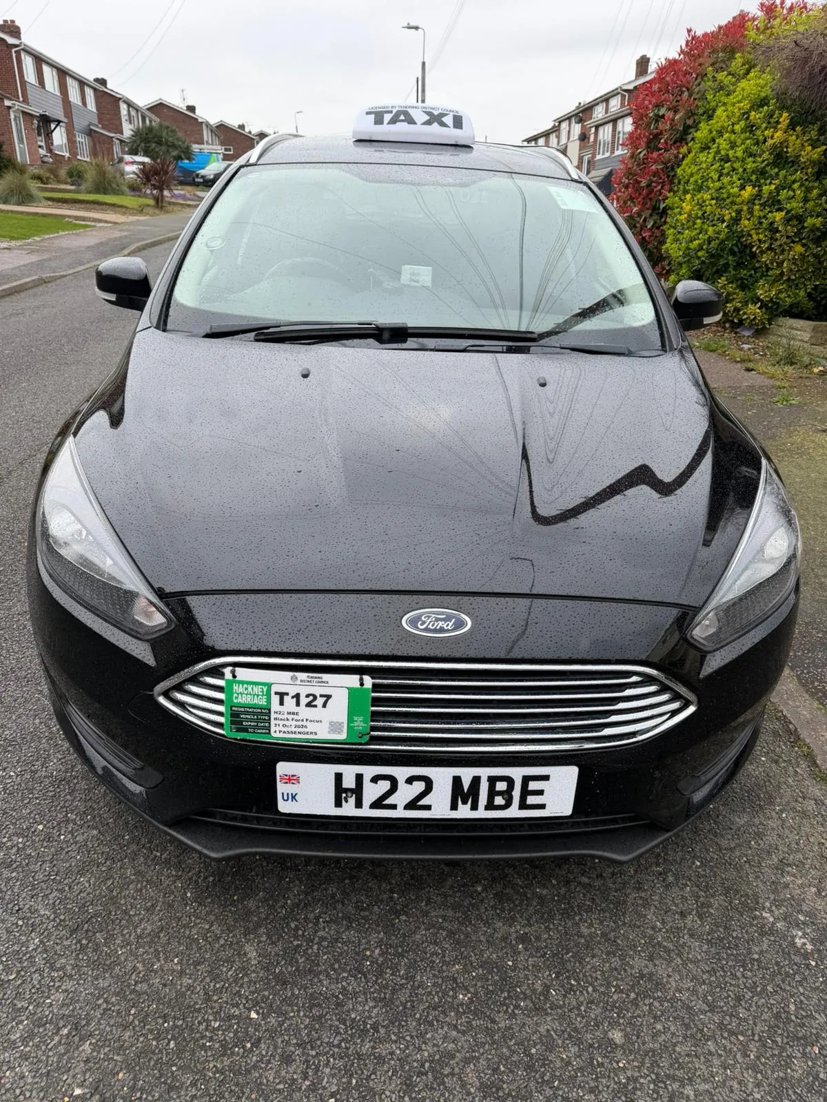 MBE Minicabs black Ford saloon W22 MBE - professional taxi in Harwich